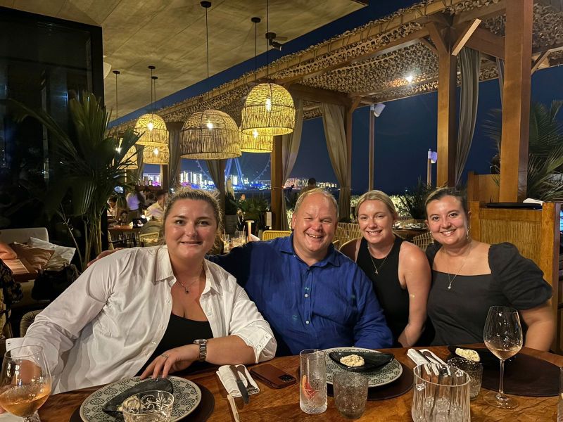 Alastair Turner, second from left, seated with Aspectus colleagues at a table in Dubai