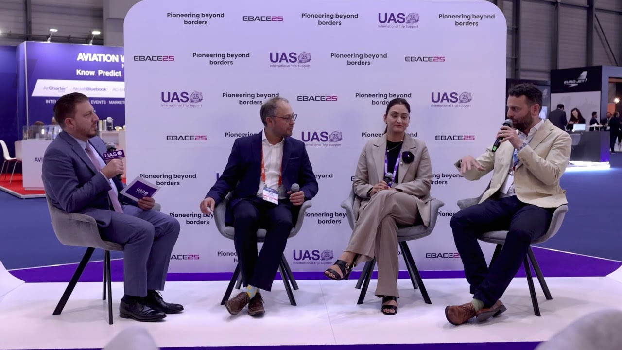 Alek Vernitsky, second from left, joins three fellow participants for a seated discussion at EBACE 2025