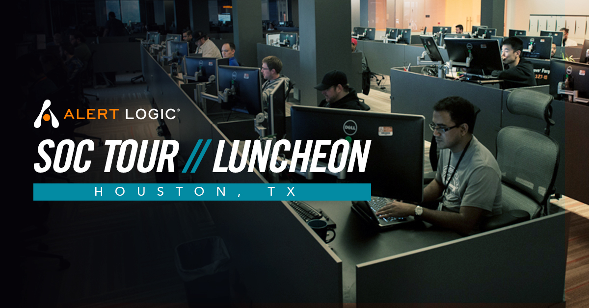 Alert Logic analysts at workstations in a historical promotional image for a Houston SOC tour