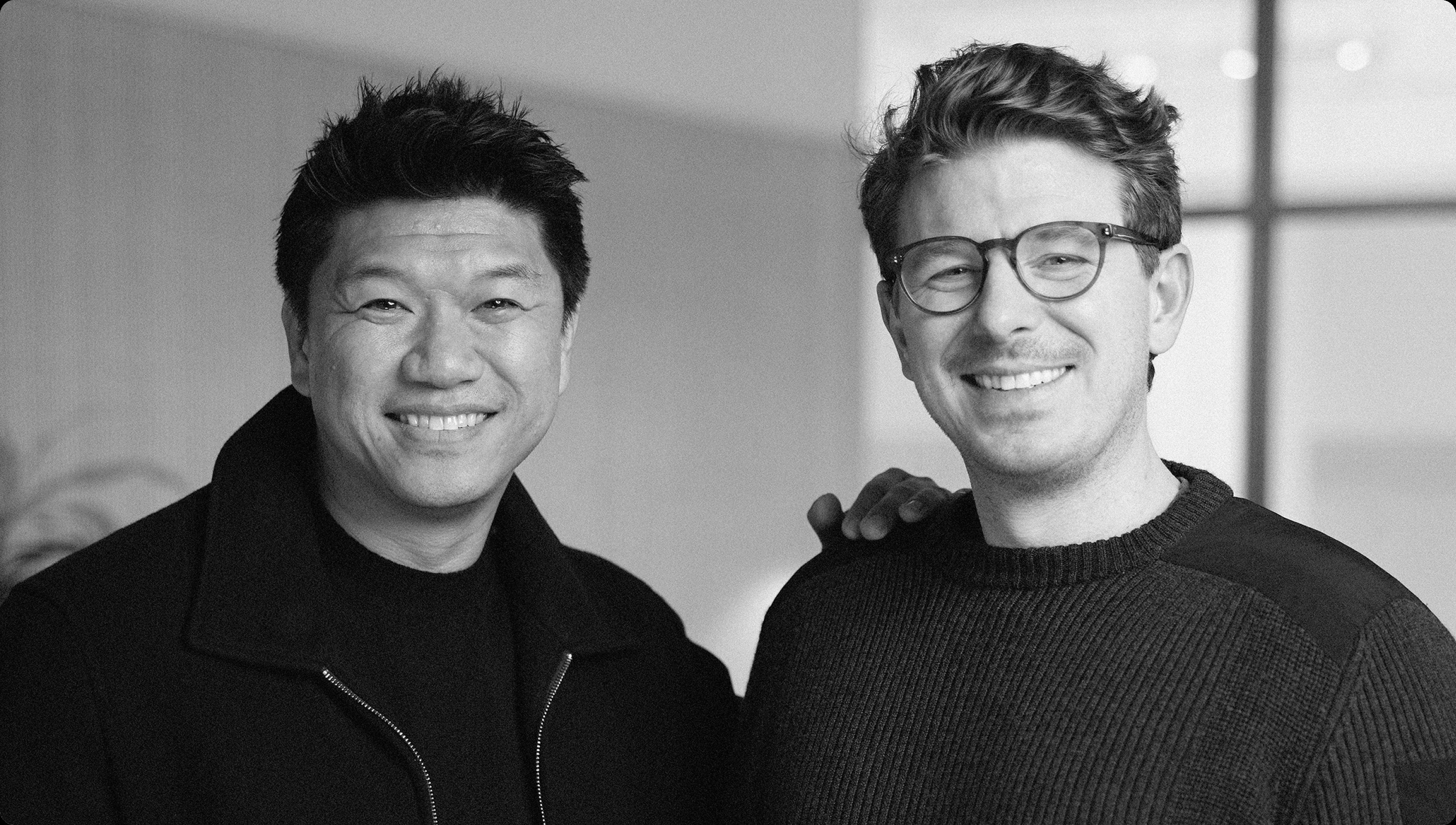 Michael Wang, left, and Alex Hejnosz, right, smiling together