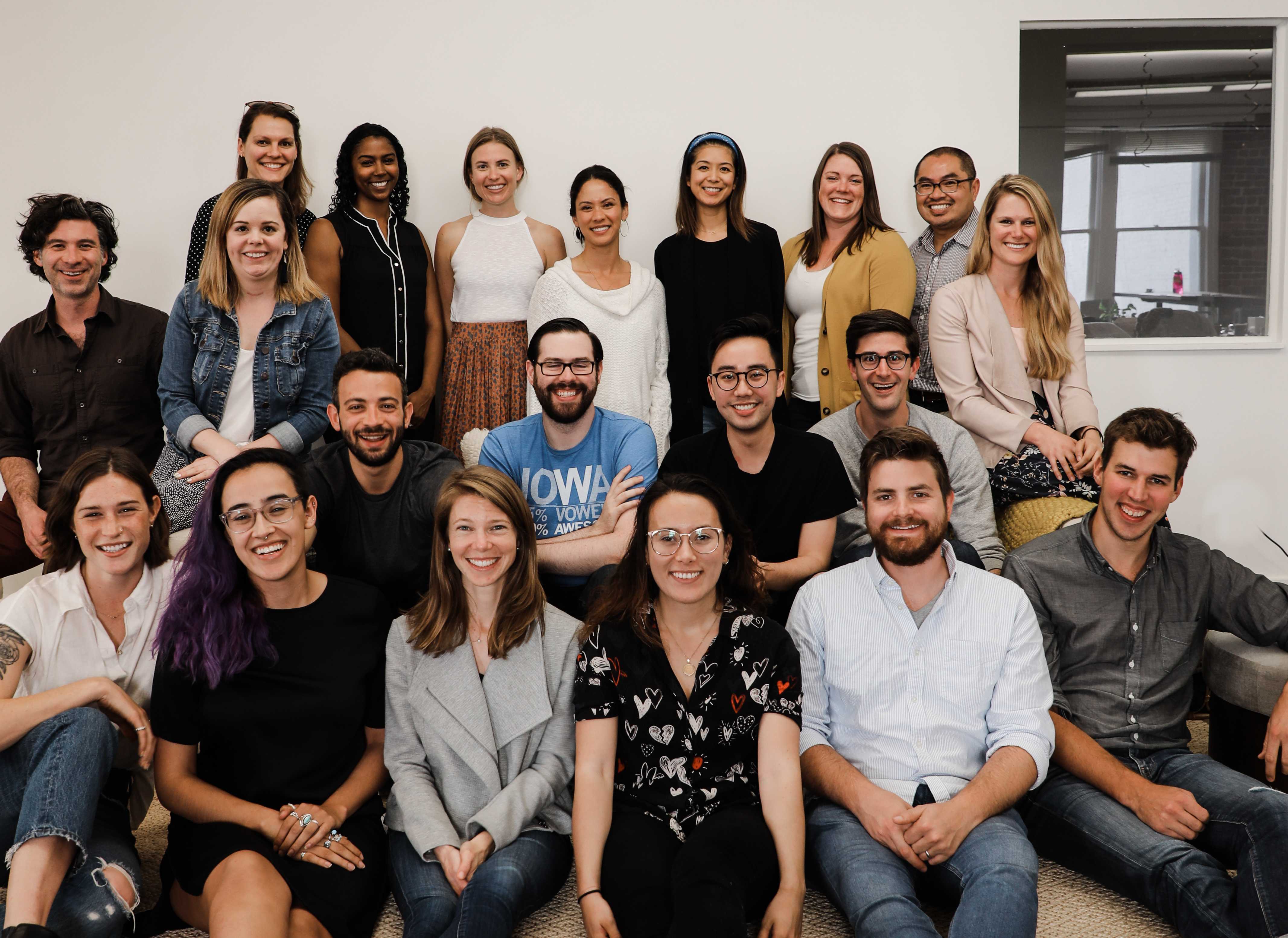 An early Two Chairs team gathered for a group photograph