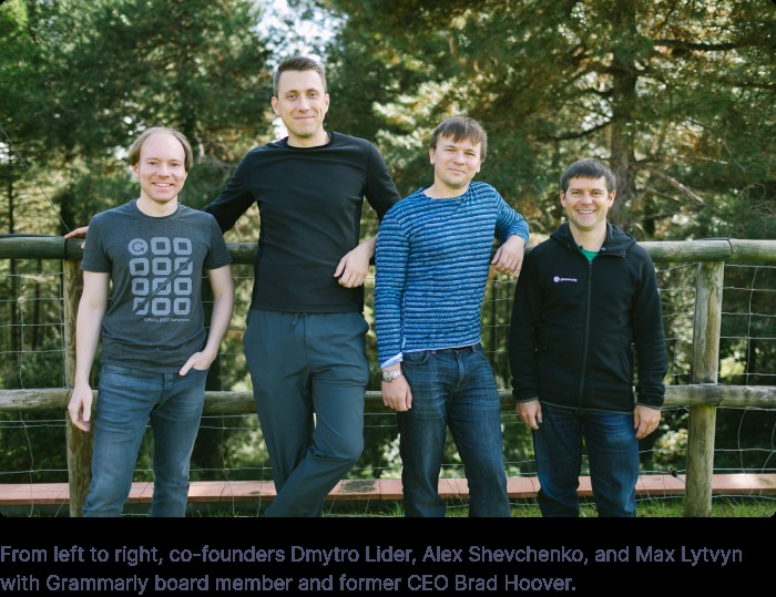 Grammarly co-founders Dmytro Lider, Alex Shevchenko, and Max Lytvyn outdoors with former CEO Brad Hoover