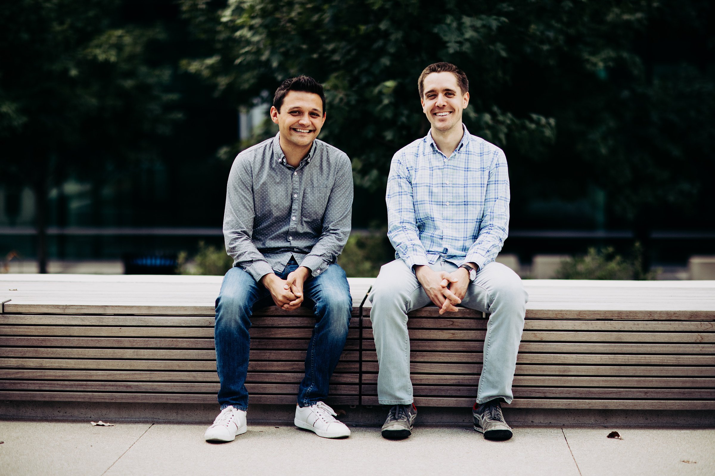 Alex Timm, left, and Root co-founder Dan Manges seated outdoors