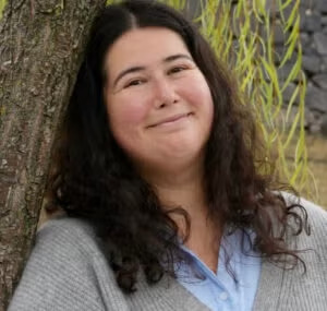 Alexa Raff outdoors beside a tree