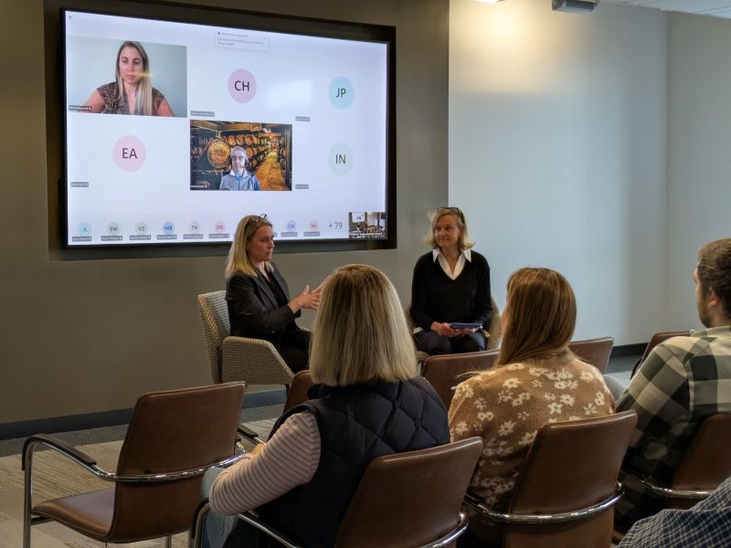 Alison Durant speaks with employees during a seated coffee chat at Advisor360