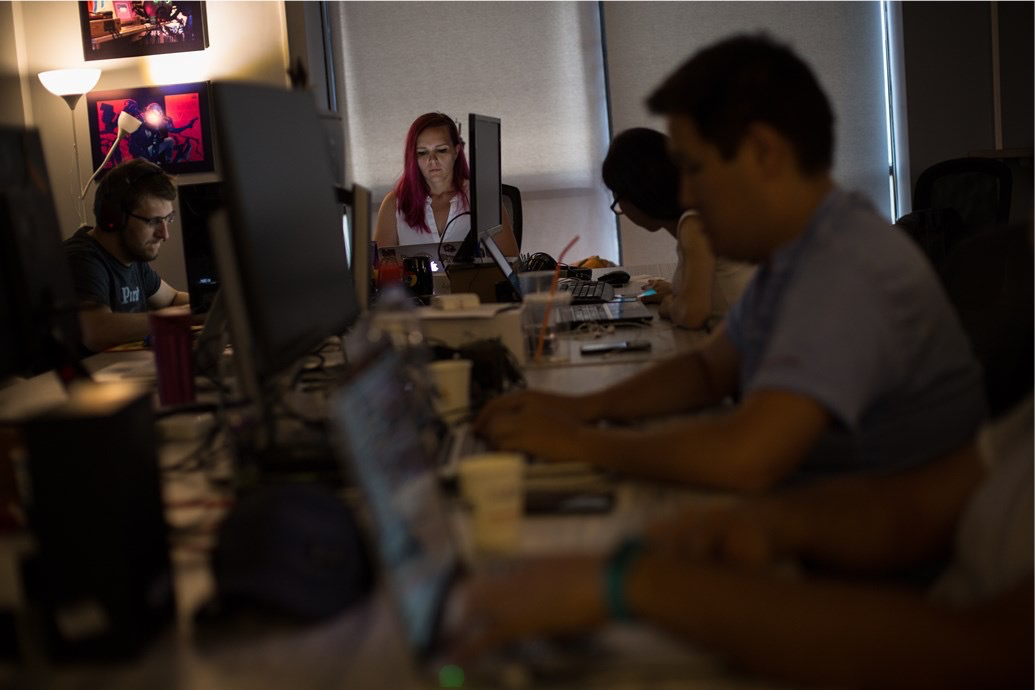 Alla Klimenko working among colleagues in the Bishkek office