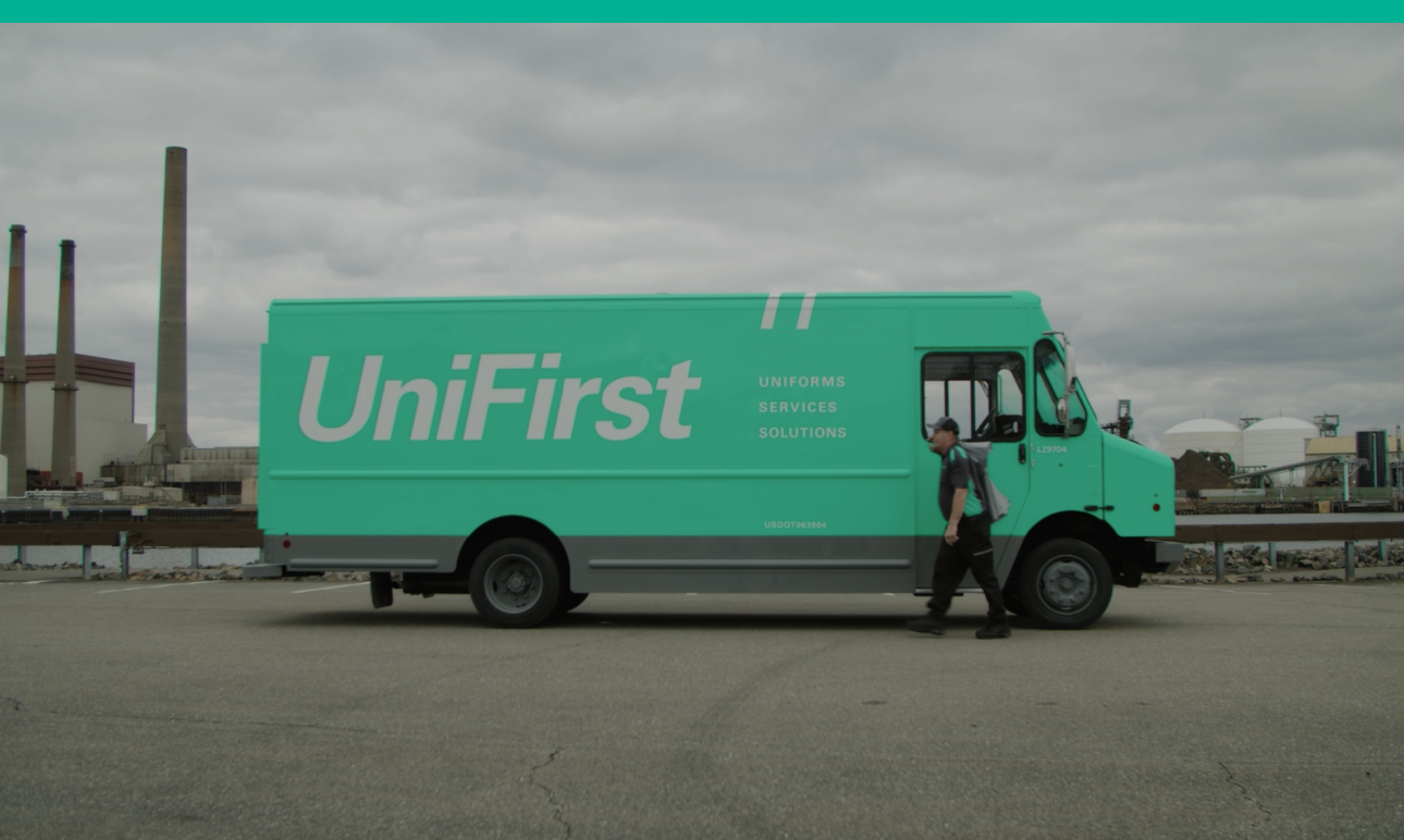 A teal UniFirst delivery truck from A&G's digital transformation case study