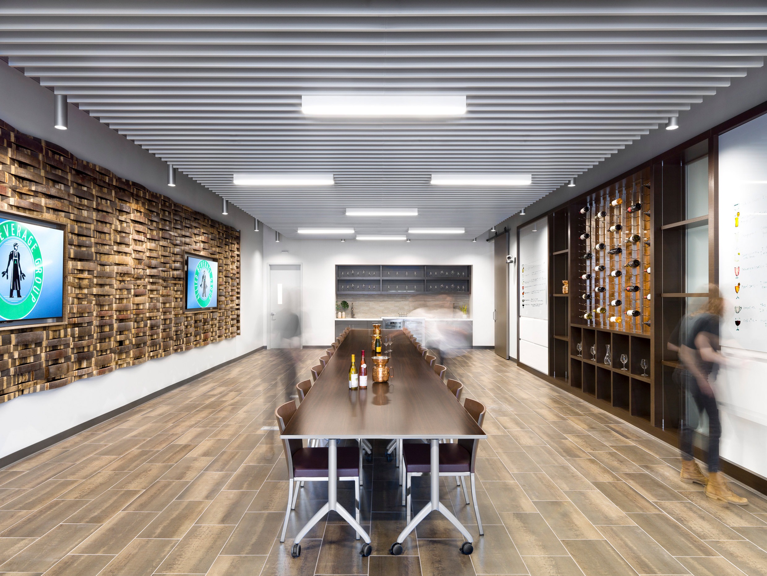 Long tasting table and bottle displays inside Allied Beverage Group’s Elizabeth facility