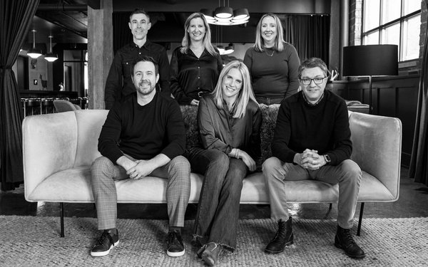 Latitude's leadership team gathered together after its December 2025 appointments
