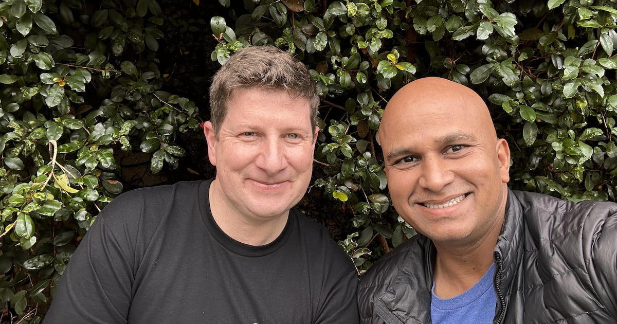 Spearline founder Kevin Buckley on the left with Alok Kulkarni outdoors