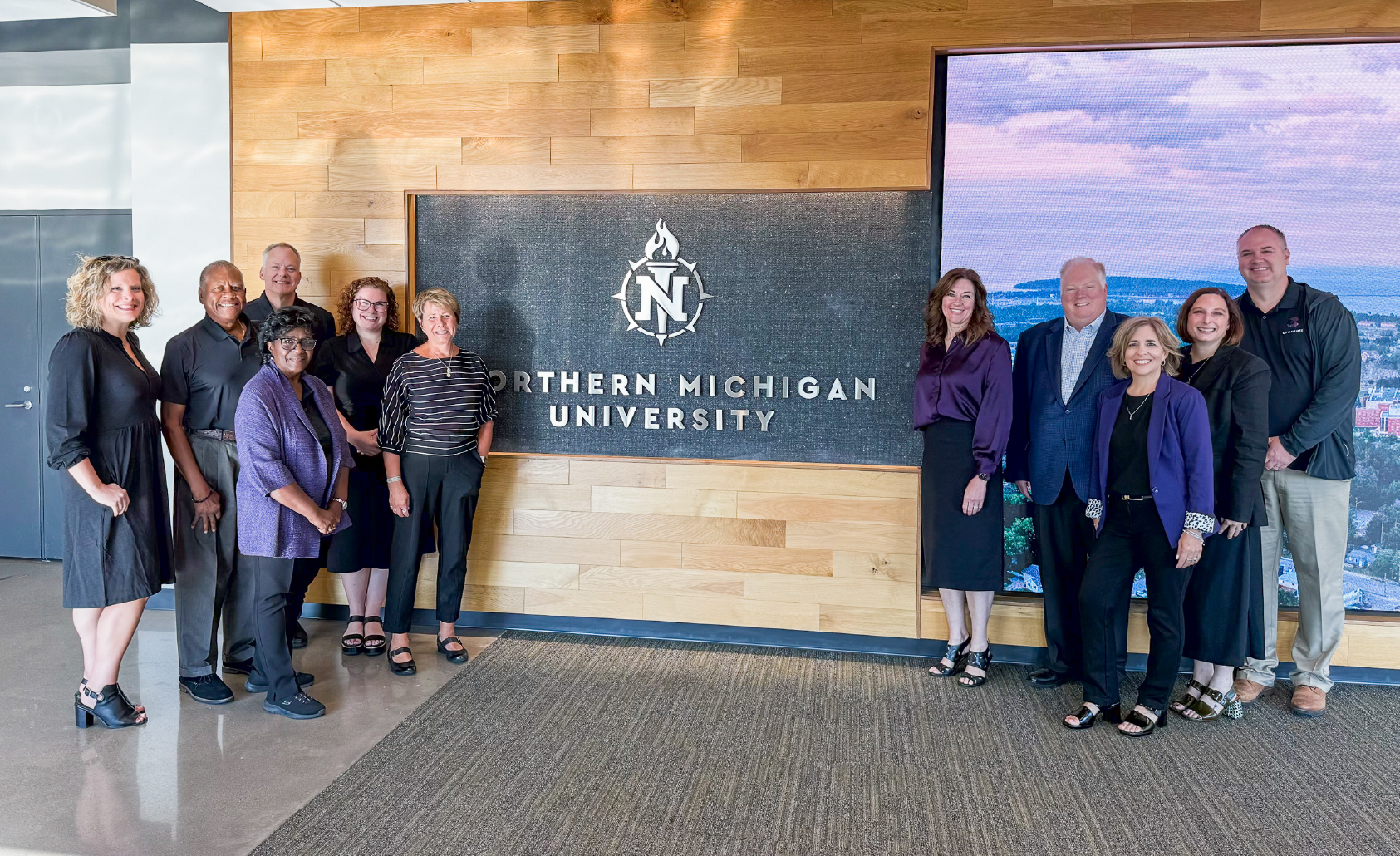 University and credit union representatives gathered at Northern Michigan University for the Financial Commons opening