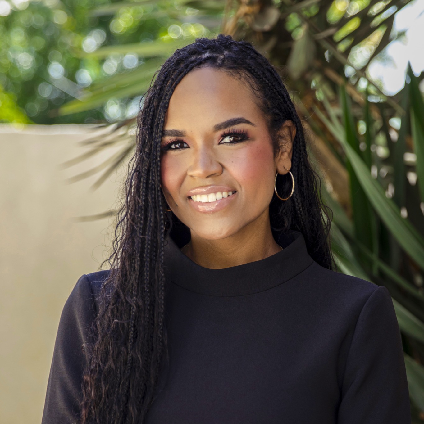 AM PR Group founder Vanessa Anderson, wearing black, photographed outdoors