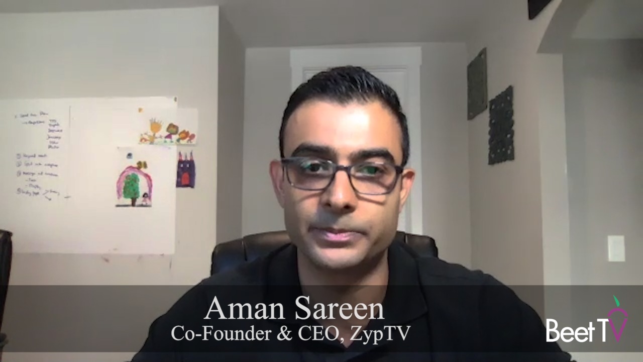 Aman Sareen wearing glasses during a remote Beet.TV interview in 2020
