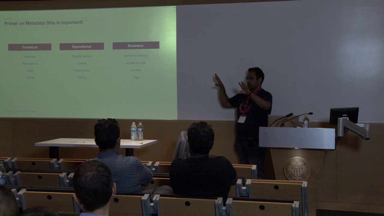 Amandeep Khurana explaining metadata to an audience at Data Con LA in 2018