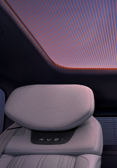 AUDI cabin detail below an illuminated panoramic roof