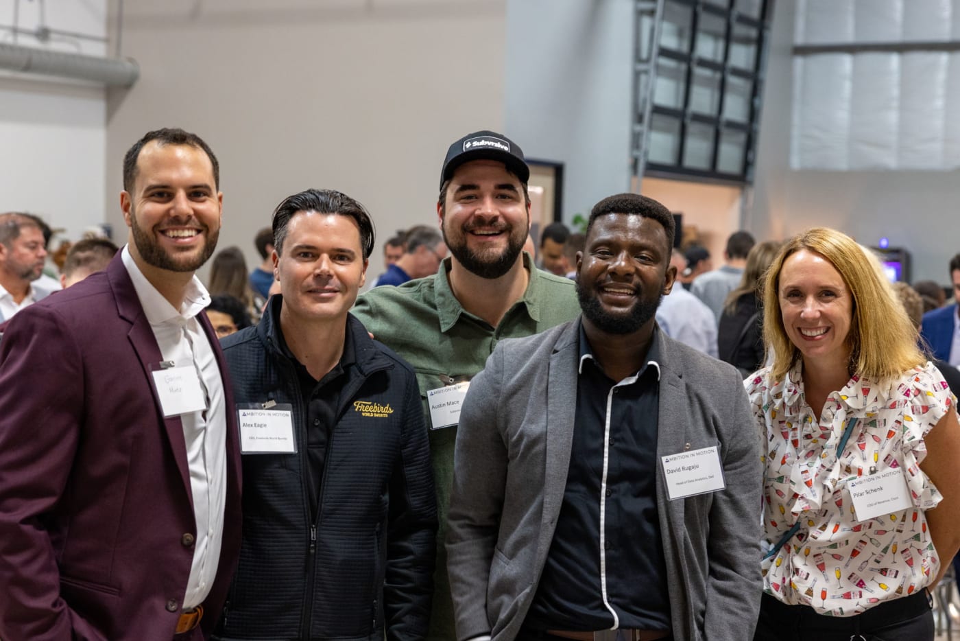 Garrett Mintz with fellow participants at an AIM Executive Symposium in December 2022
