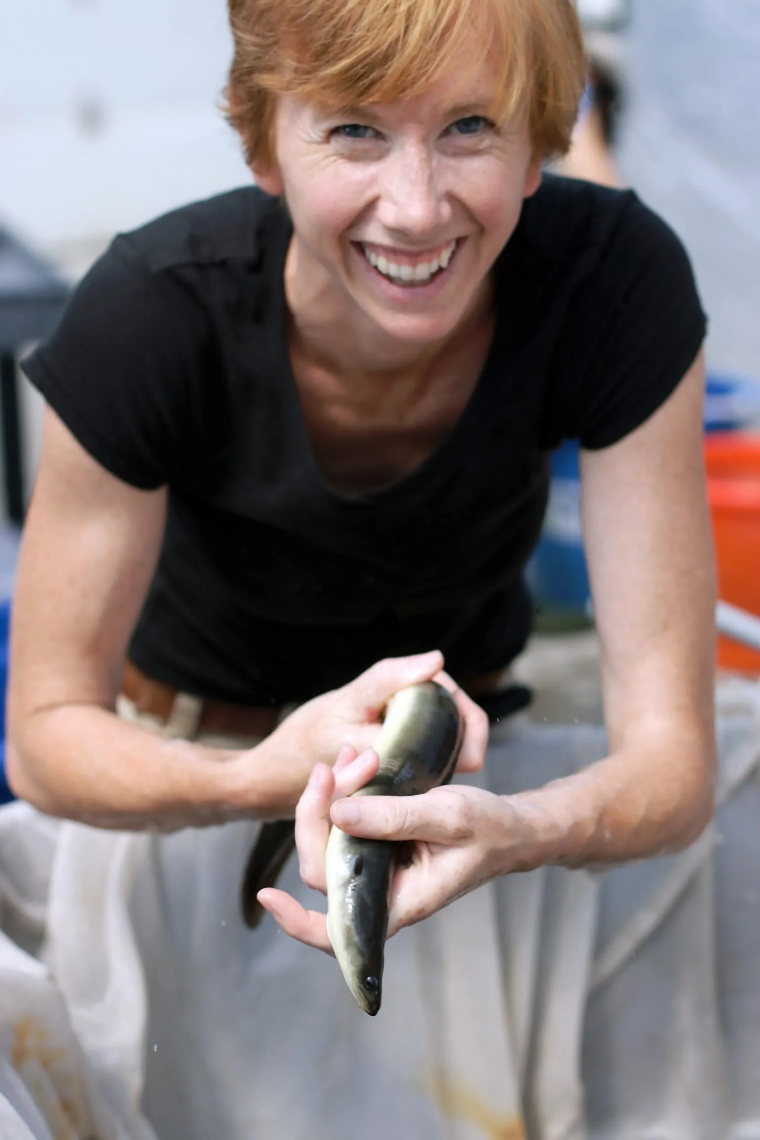 American Unagi founder Sara Rademaker holding a mature American eel