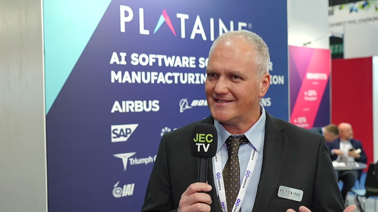 Amir Ben-Assa speaking into a JEC TV microphone at JEC World 2024