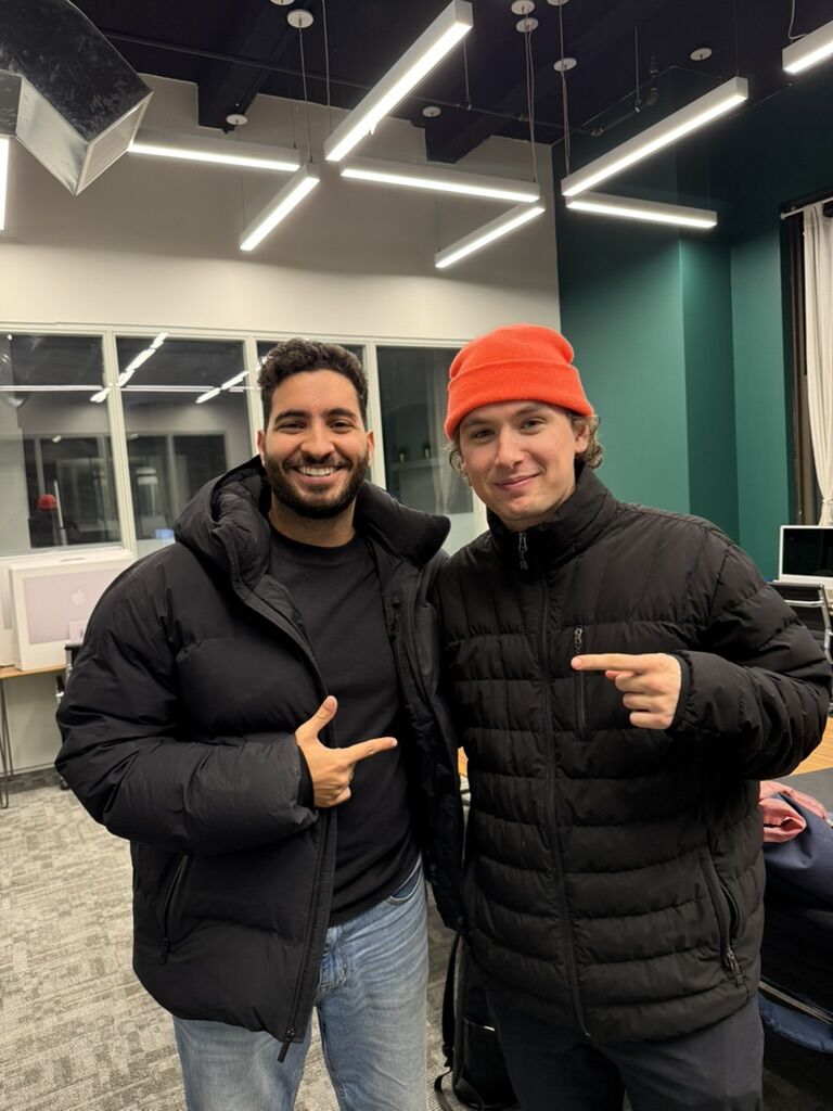 Amir Hanna and Oliver Manilow together indoors