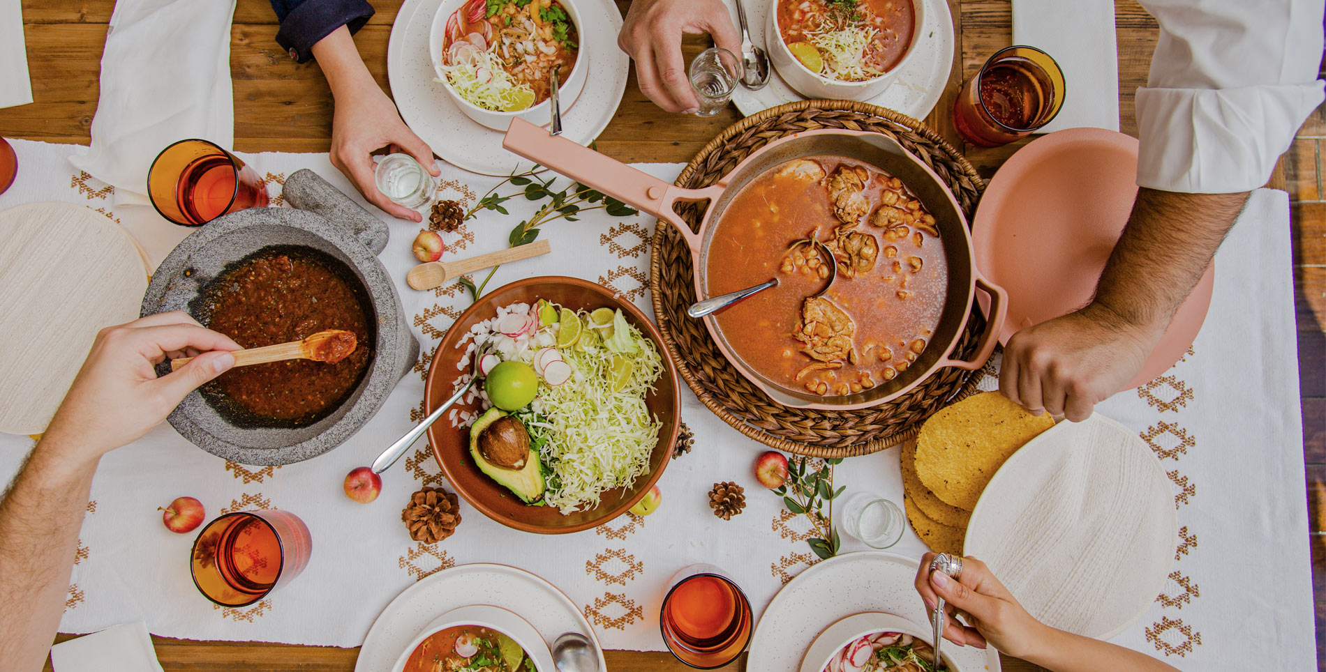 A shared meal served in Our Place cookware and tableware during the company’s early days