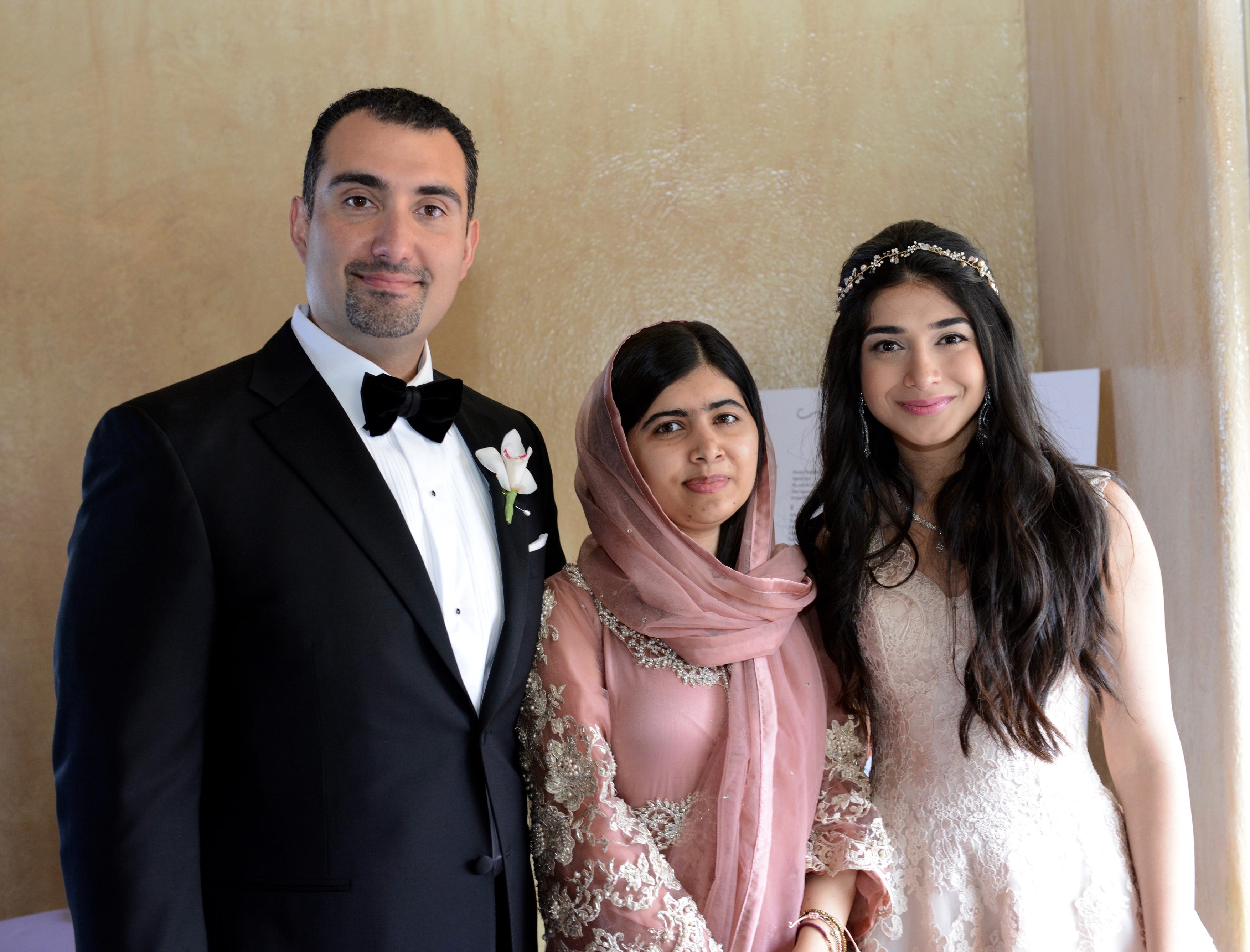 Amir Tehrani and Shiza Shahid at their wedding