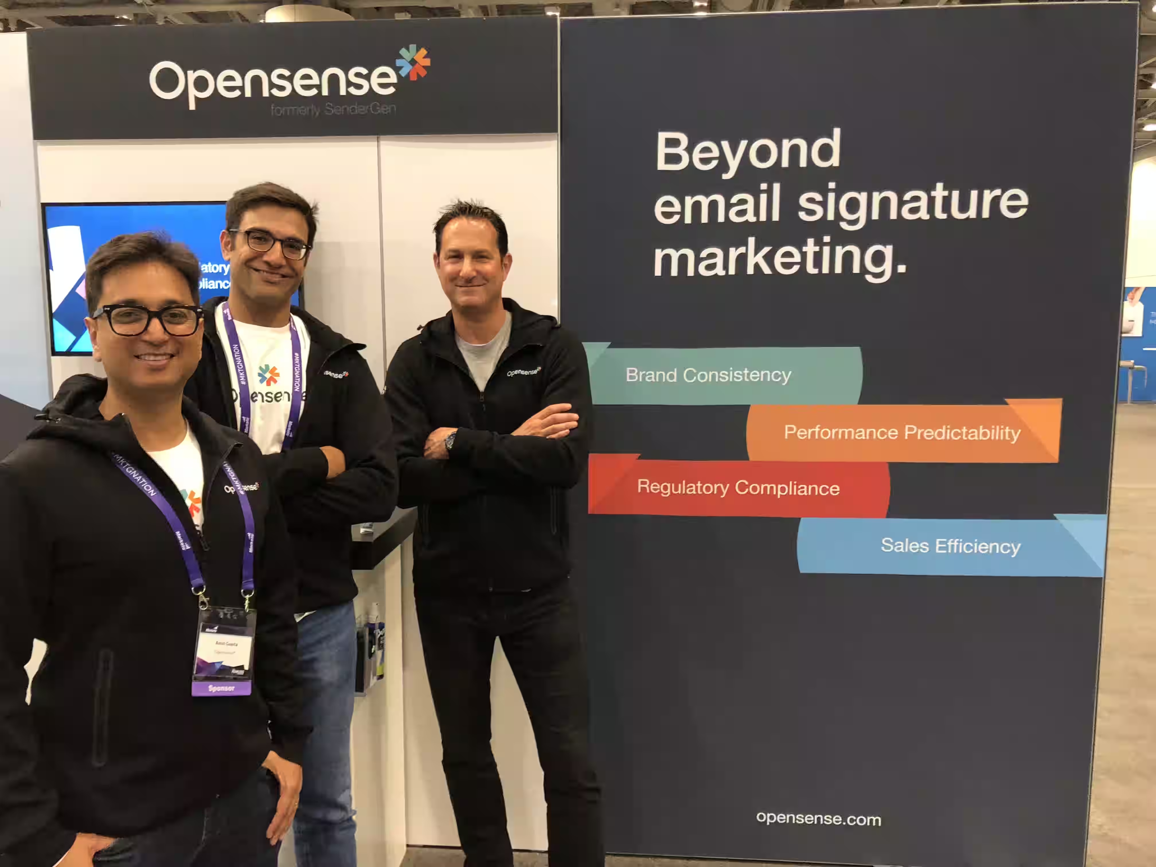 Amit Gupta, at left, with Opensense co-founders at their launch-era conference booth
