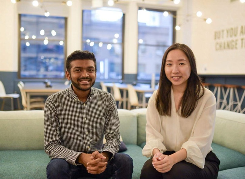 Patronus AI co-founders Anand Kannappan and Rebecca Qian seated together on a sofa in an office