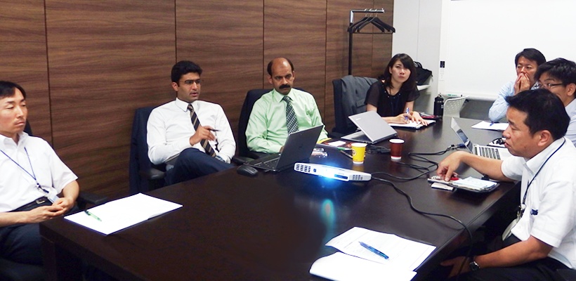 Anandbir Singh Brar, seated second from left, in a business meeting during Excelra's 2016 visit to Japan