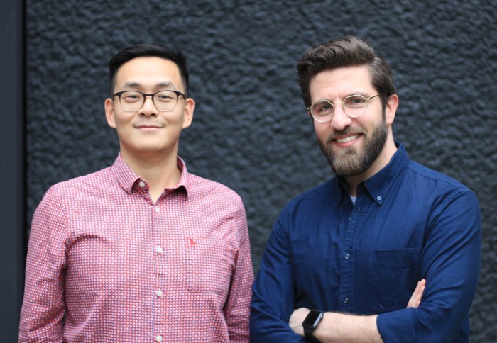 Jing Ouyang, left, and Anas Nader standing together