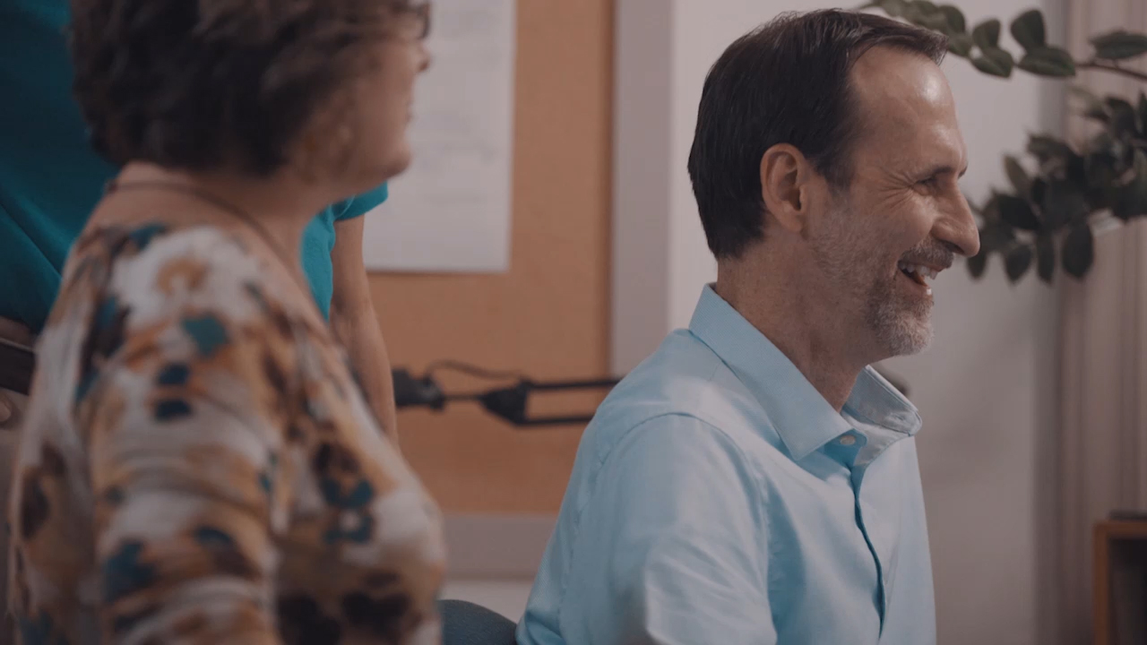 Anderson Group colleagues smiling during a meeting