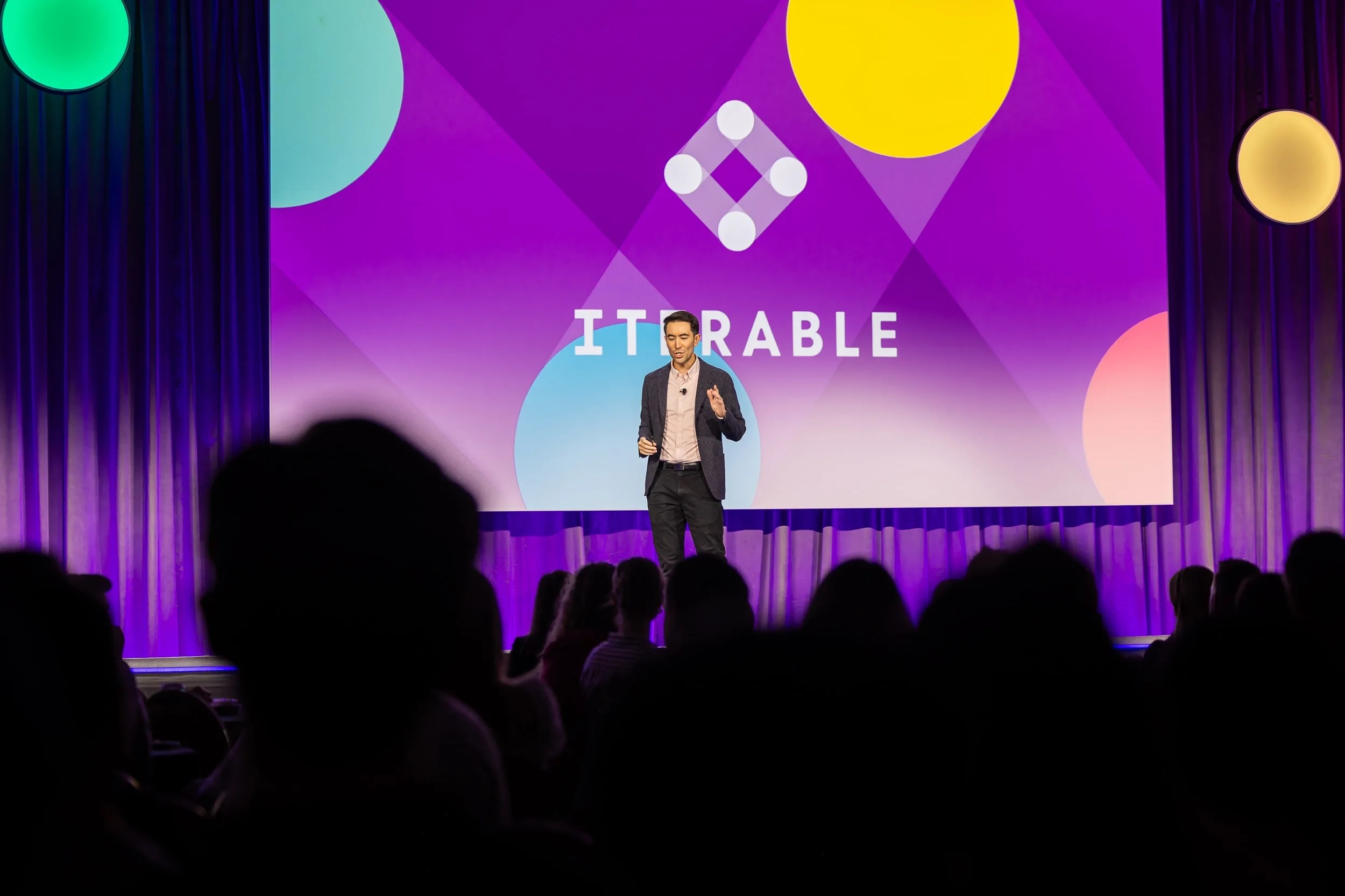 Andrew Boni speaking onstage at Iterable Activate 2024 in San Francisco