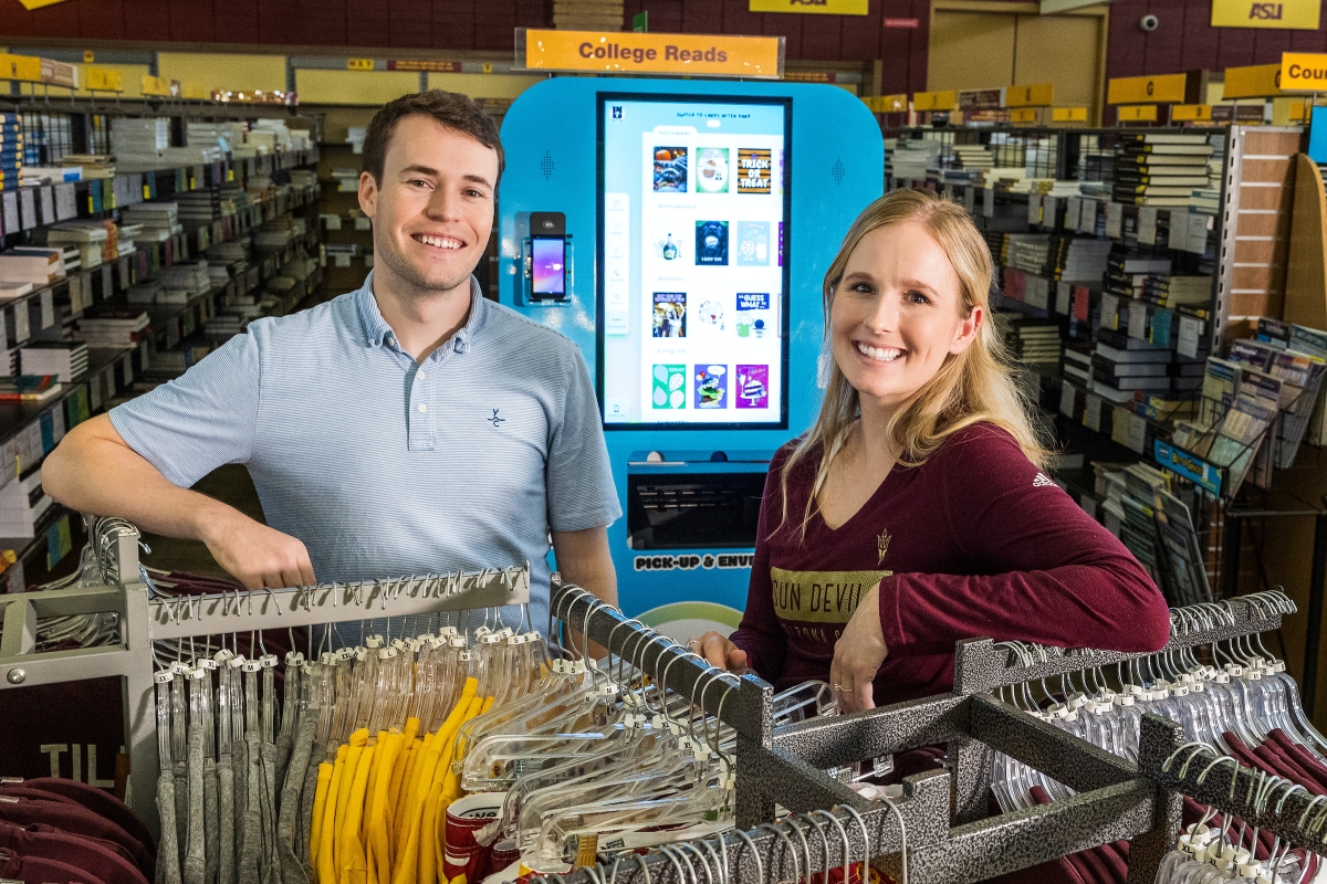 Andrew Ekmark with the Ink'd Greetings card kiosk
