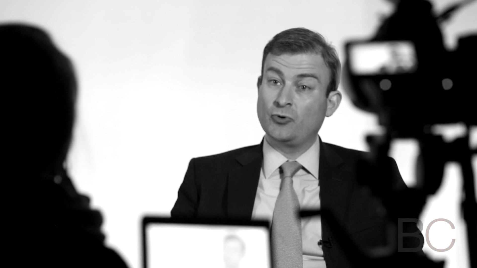 Andrew Hayek speaking during a filmed BizCastHQ interview