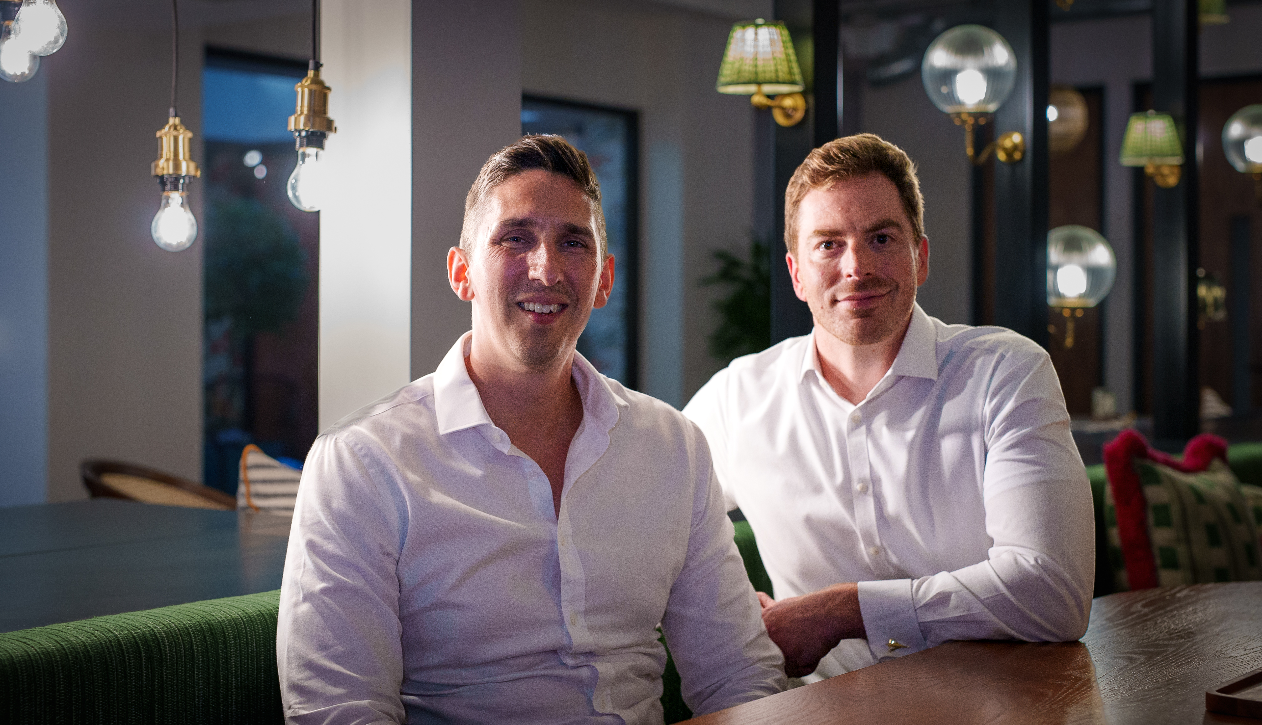 Novatus co-founders Matthew Ranson, left, and Andrew Hedley, right, seated together