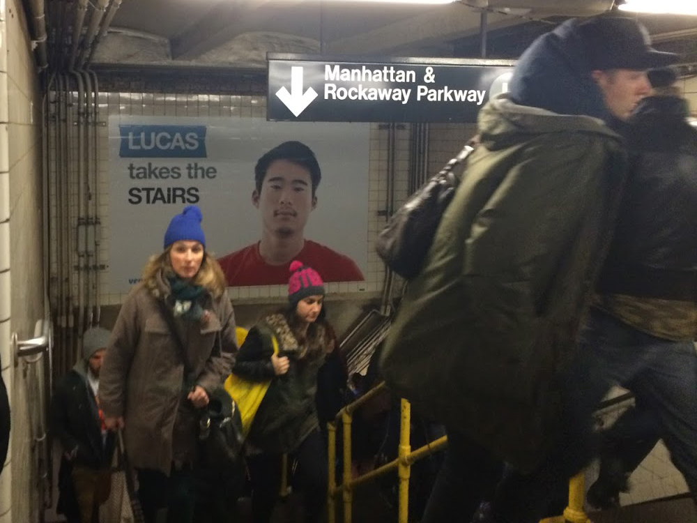 Venmo’s Lucas takes the stairs advertisement installed above subway stairs