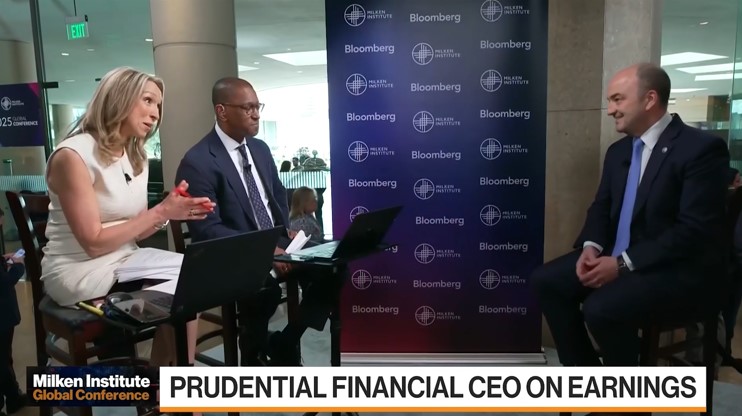 Andrew Sullivan sits at right opposite two Bloomberg interviewers at the 2025 Milken Institute Global Conference