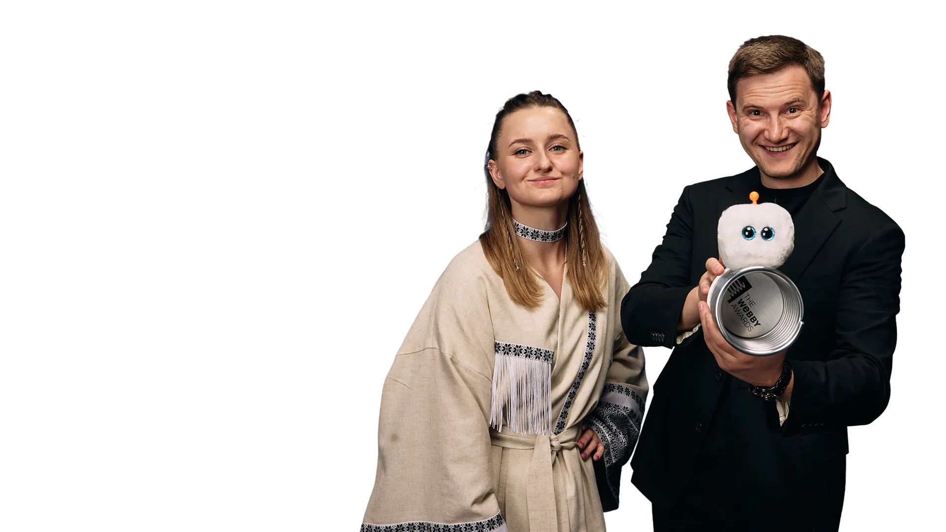 Andriy Sambir with a colleague holding a Webby award and a company mascot