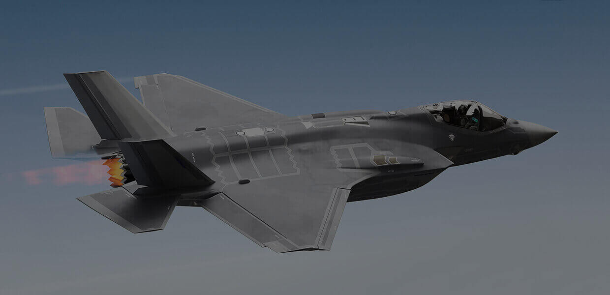 Military aircraft in flight in an aviation photograph published by ASI