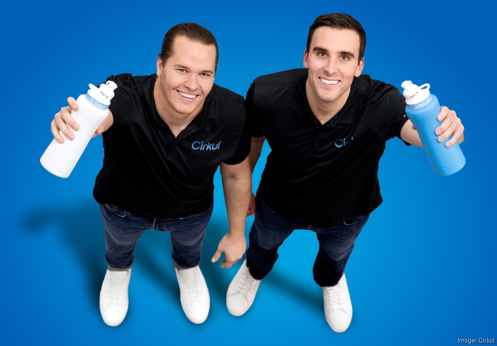 Garrett Waggoner, left, and Andy Gay holding Cirkul bottles against a blue background