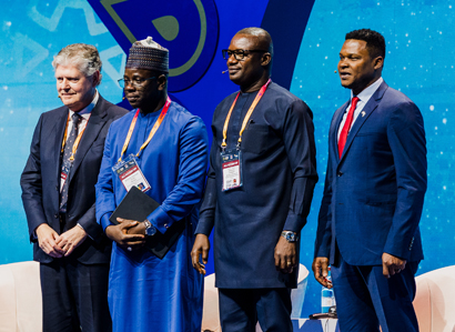 Andy Inglis, far left, standing with three fellow participants at an energy event