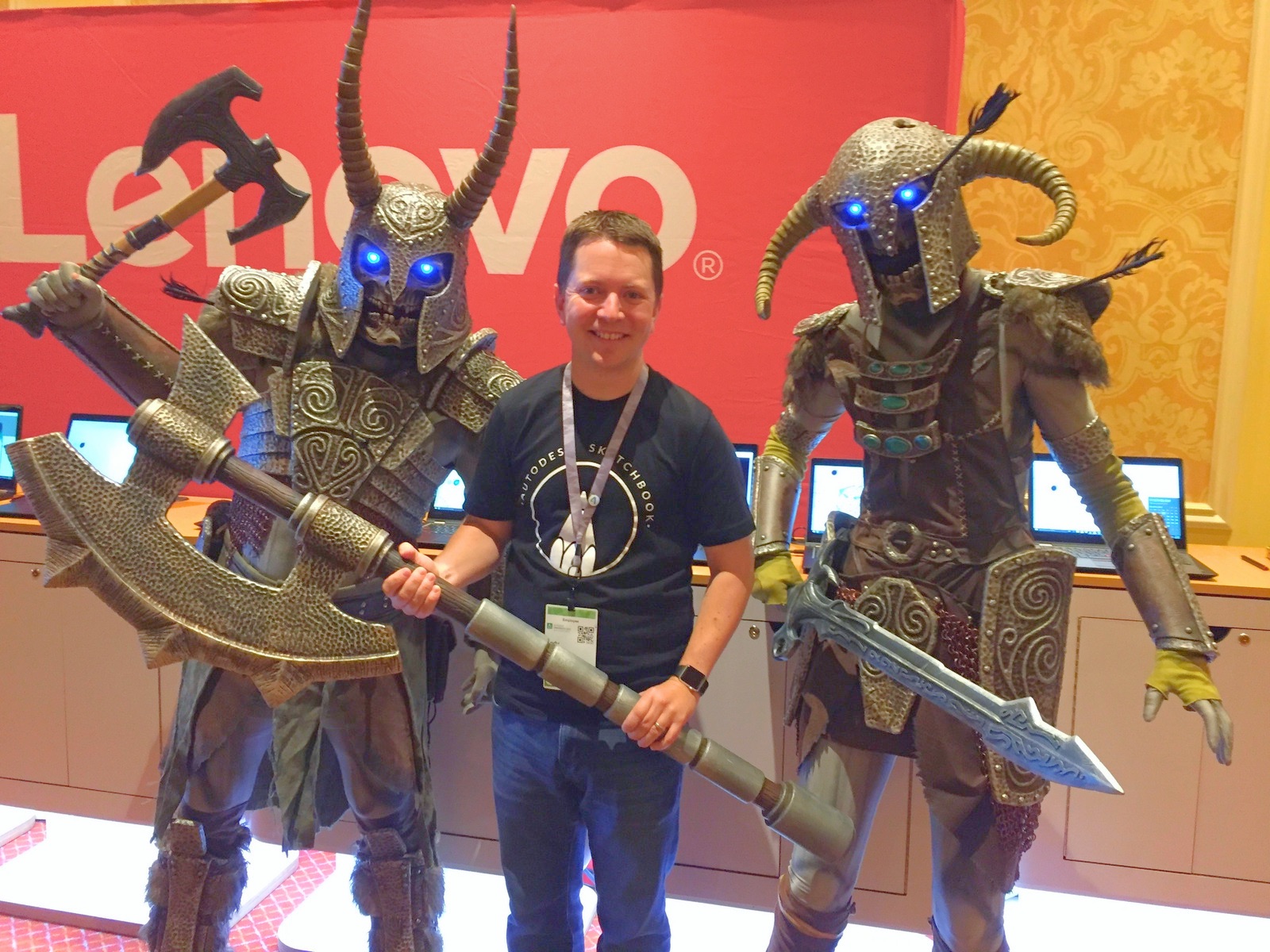 Andy Mott posing with costumed monsters at Autodesk University