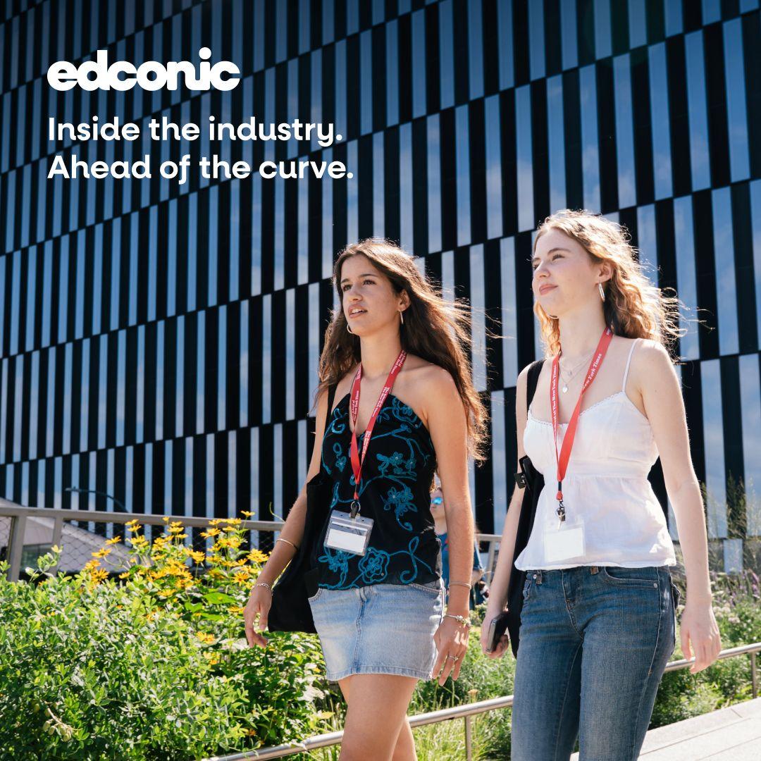 Edconic promotional photograph showing two students outdoors beside a modern building