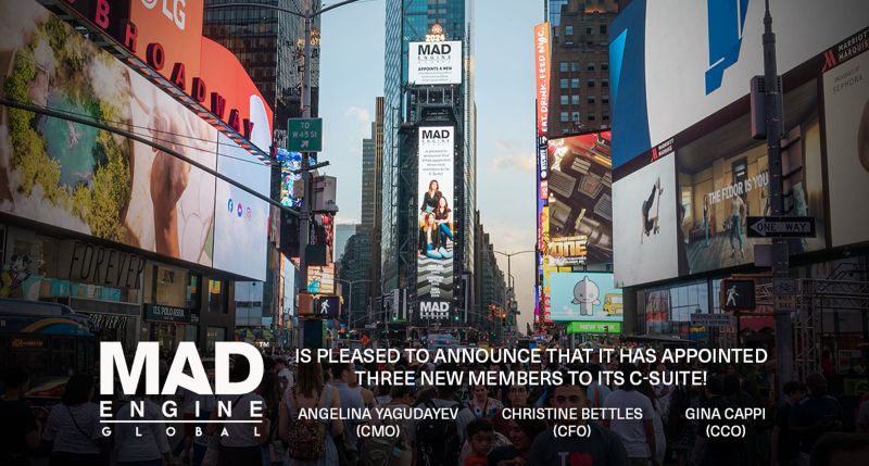 A Times Square billboard announcing Angelina Yagudayev, Christine Bettles and Gina Cappi as Mad Engine C-suite appointees