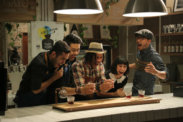 A scene from Filosofi Kopi inside its coffee shop