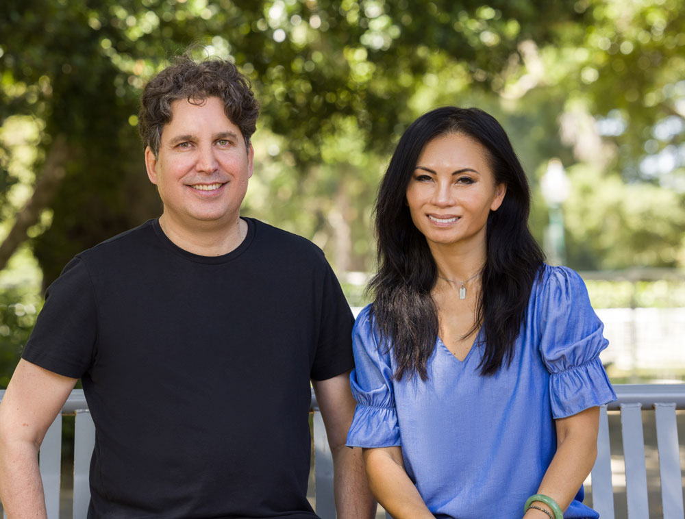 NoteGoat co-founders Aaron Wingert, left, and Anh Hatzopoulos, right, seated outdoors