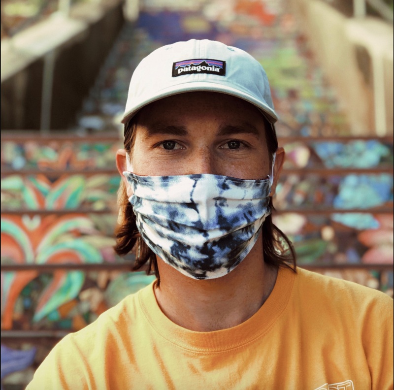 Brendan Rhatigan, listed as a developer on AnonimA’s archived team page, wearing a patterned face covering