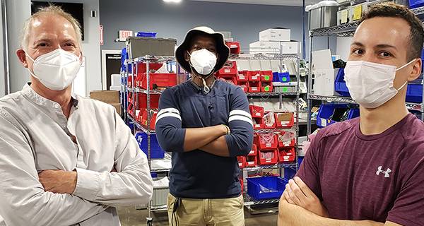 Anova production team in a company photograph