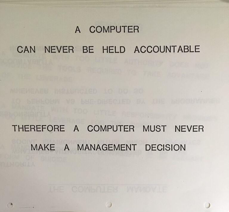 A photographed statement about computers, accountability and management decisions, shared in Avinash’s panel post