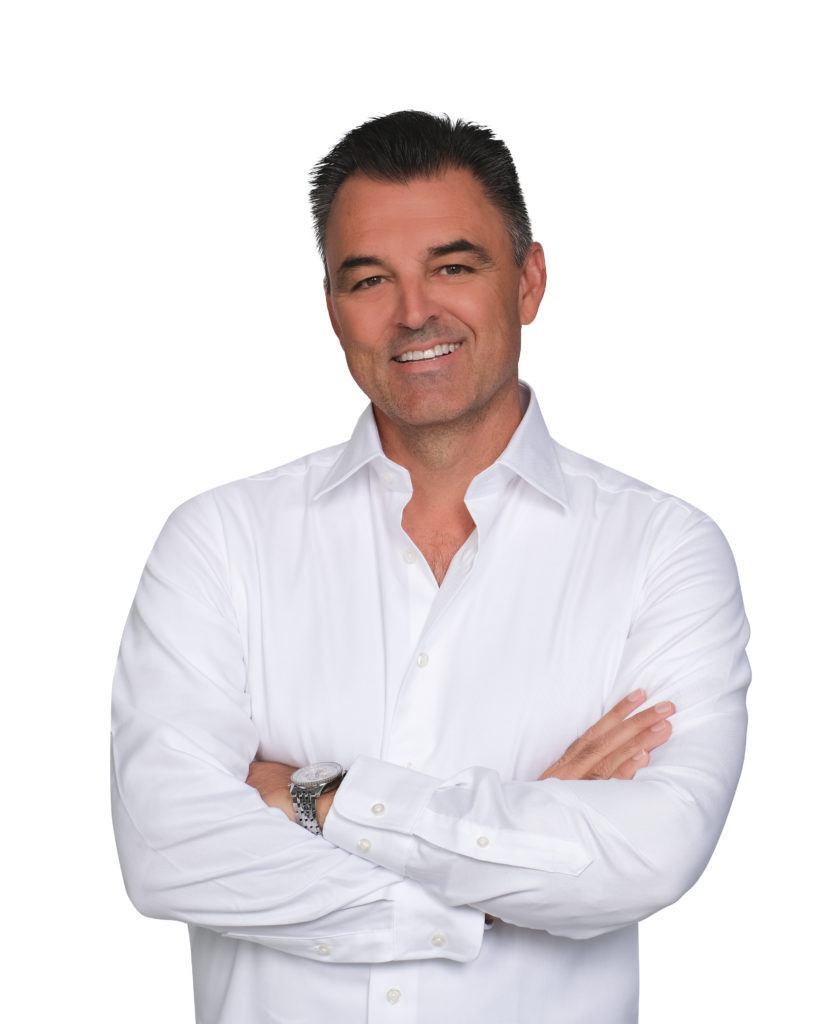Anthony Ferry in a white shirt against a white background