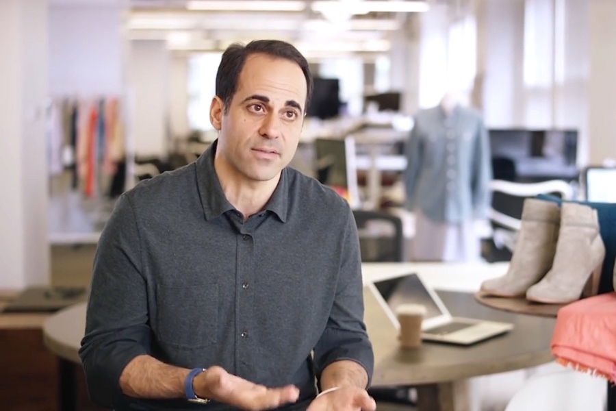 Anthony Marino speaking in a ThredUp workspace during a 2016 USPS interview
